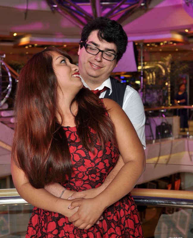 Nick and Andie dressed up on a cruise